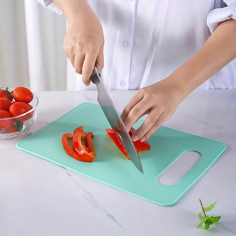 Colorful plastic cutting board for fruit and vegetable chopping, available in multiple colours – Purease