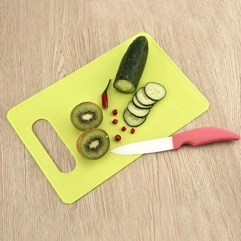Colorful plastic cutting board for fruit and vegetable chopping, available in multiple colours – Purease