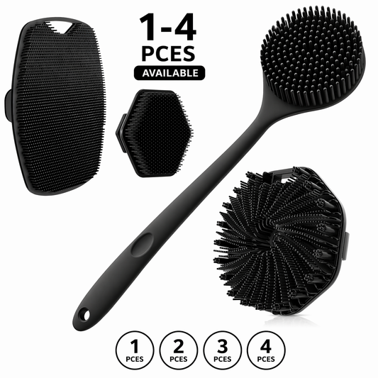 Set of black grooming brushes with varying sizes on a white background