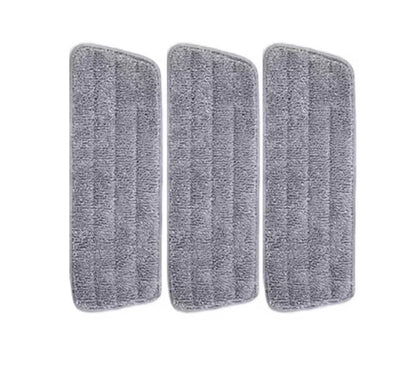 Three gray microfiber mopping pads on a white background